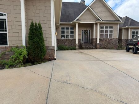 Why Red Clay Stains Ruin Newnan Concrete Driveways and How to Fix Them