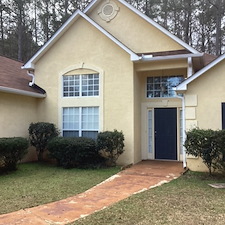 Stucco-house-and-Painted-Sidewalk 0