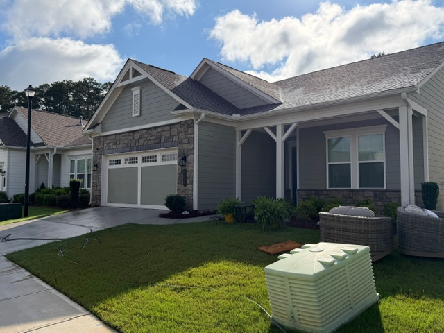 Vinyl house wash and concrete in Newnan,GA Thumbnail